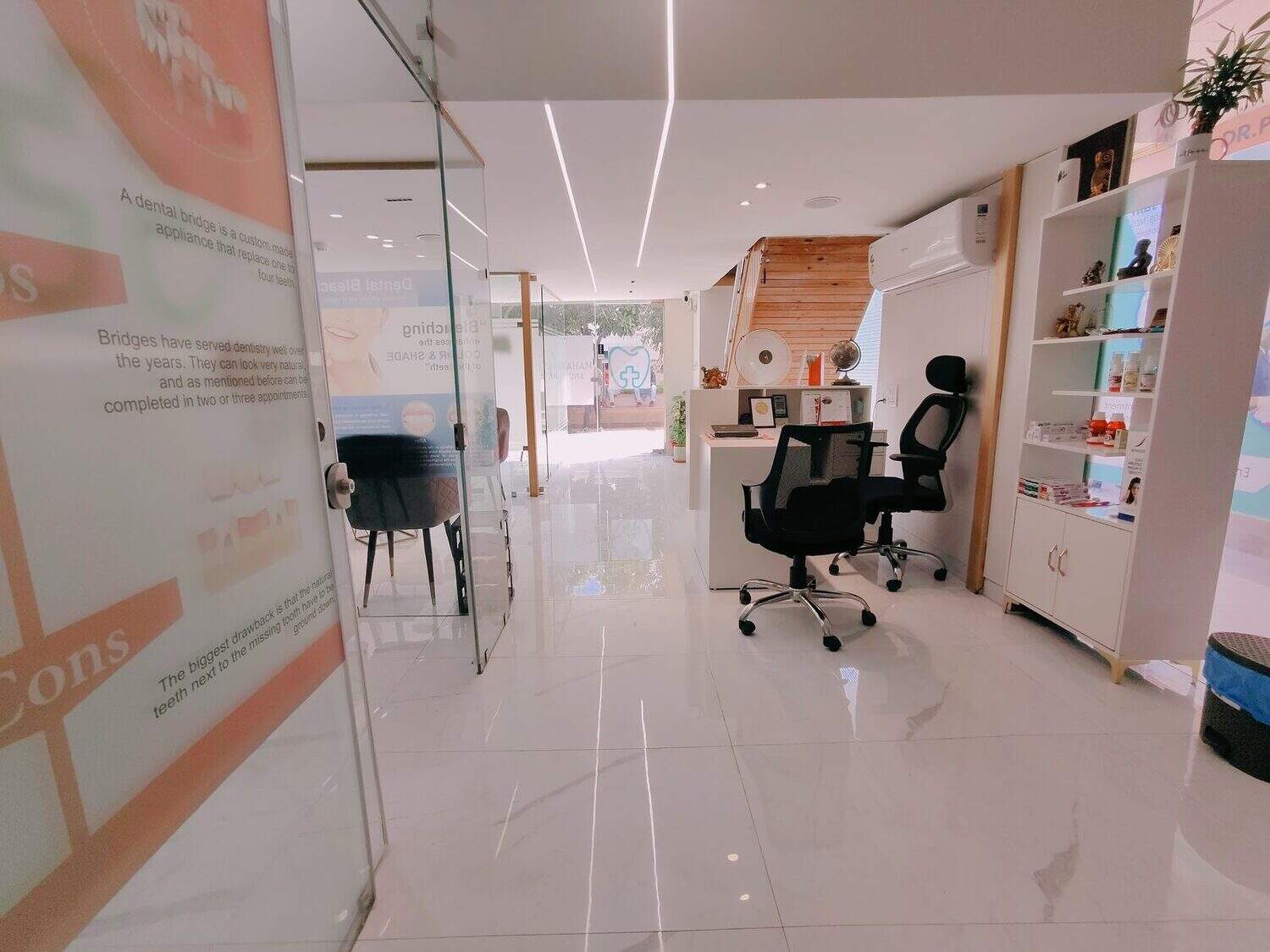 Inside Mahavirai Dental and Medical Care, looking down the corridor towards reception